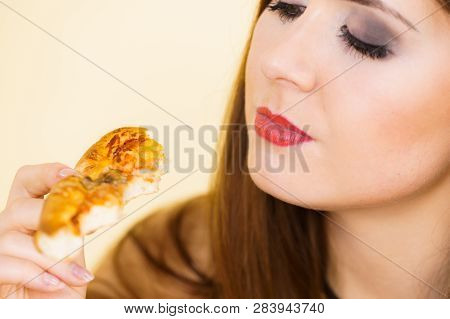 Young Woman Eating Hot Fresh Pizza Slice. Delicious Fast Food Meal. People, Italian Cuisine Concept.