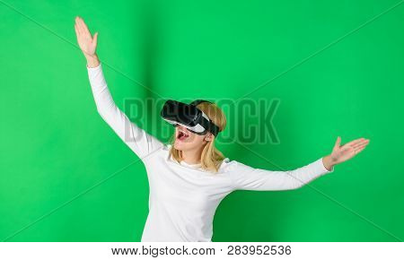 Woman Wearing Virtual Reality Goggles. Excited Smiling Businesswoman Wearing Virtual Reality Glasses