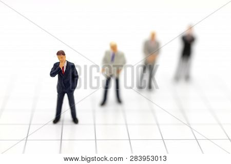 Miniature People, Group Of Businessmen Work With Team, Using As Background Choice Of The Best Suited