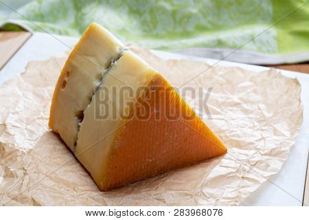 French Semi-soft Cow Milk Cheese Morbier From Franche-comte Region With Thin Black Layer And Strong