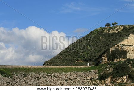 View Of A Green Hill Near Germasogeia Dam, Cyprus On A Sunny Winter Day
