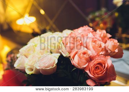 Close Up Of A Beautiful Bouquet Of Roses In Soft Colors. Bockeh Background, Restaurant In Deaf. Shal