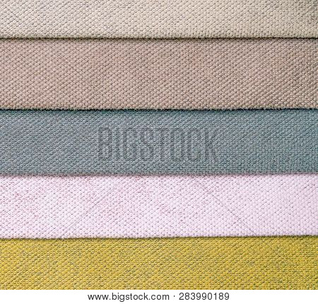 Colorful And Bright Fabric Samples Of Leatherette Furniture And Clothing Upholstery. Close-up Of A P