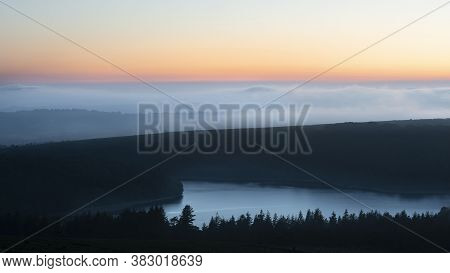 Majestic Landscape Image Of Cloud Inversion At Sunset Over Dartmoor National Park In Engand With Clo