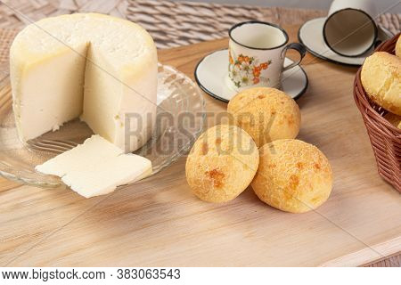 Minas Cheese, Cup Of Coffee And Cheese Bread From Brazil, Arranged On A Table With Beige Tablecloth