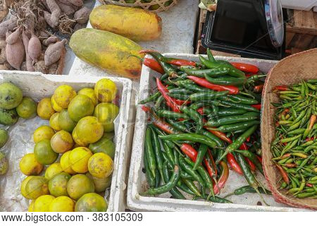 Red Chili Peppers On The Market. Pile Of Green Chilli Pepper On Display For Sale In The Pudu Wet Mar