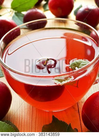 Cup Of Red Alucha Cherry Plum Compote. Shallow Dof.