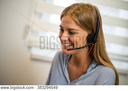 Young Modern Woman Is Working From Home. Online Operator Working At Home.