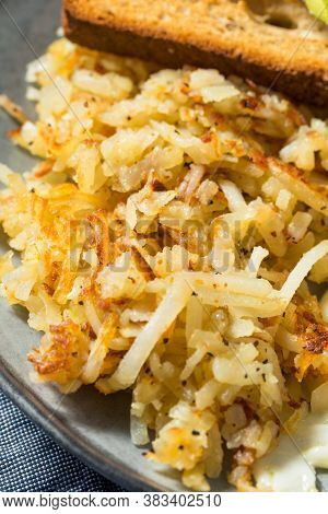 Homemade Fried Shredded Hashbrowns And Eggs
