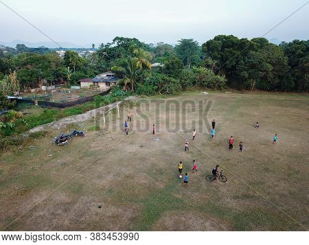 Seberang Perai, Penang/malaysia - Mar 20 2020: Local Kids Play In Football Field.