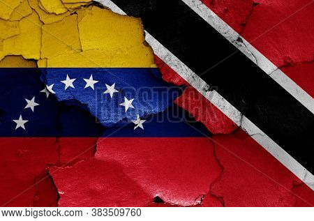 Flags Of Venezuela And Trinidad And Tobago Painted On Cracked Wall