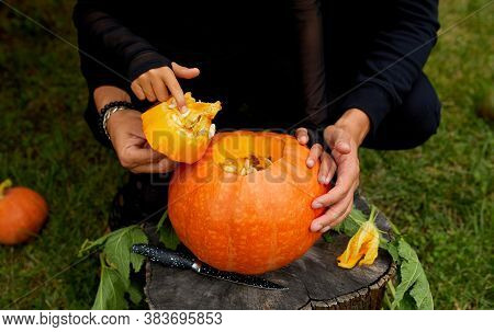Daughter And Father Hands Open, Cut Pumpkin For Halloween, Prepares Jack Olantern