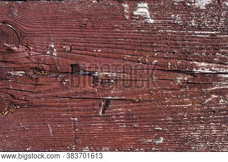 Dark Brown Scratched Wooden Board. Wood Texture. Background Wooden Board With Cracked Paint. Color-