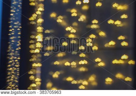 Multicolored Lights In The Form Of A Serced On A Black Background