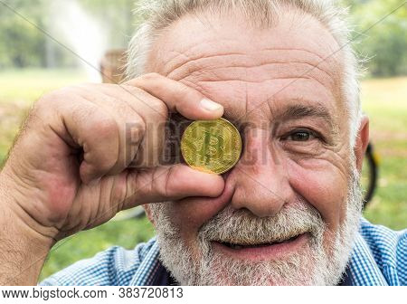 Bitcon, Man Holding Golden Coinl In Hand