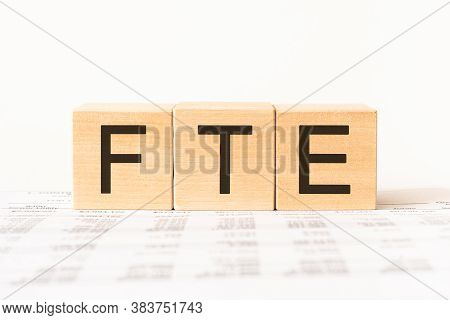 Word Fte. Wooden Small Cubes With Letters Isolated On White Background With Copy Space Available.bus