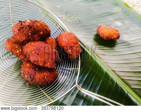 Fried Parippu Vada Placed In A Banana Leaf In Traditional Fashion.it Is Actually Made Of Dal Or Peas