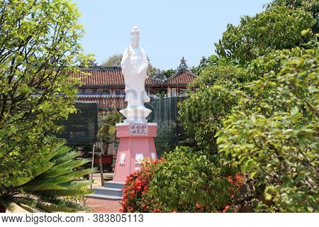 Hoi An, Vietnam,  May 3, 2020: Sculpture Of The Goddess Of Mercy In The Gardens Of The Chùa Phước Lâ