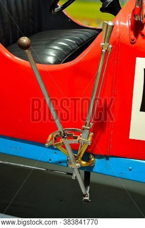 View Of The Gear Lever And The Handbrake Lever On A Race Car From The Early 20th Century
