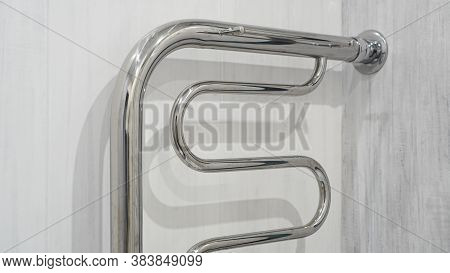 Modern Bathroom Towel Dryer - White Bathroom Interior Background