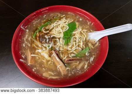 Taiwanese thickened soup noodle with lamb and squid potage