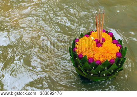 Banana Leaf Krathong Floating On River For Thailand Full Moon Or Loy Krathong Festival.