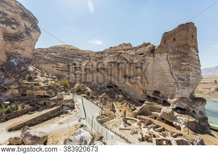 Panoramic View Of Hasankeyf Ancient Cave Houses, The Castle And The Citadel. Historic Ruins In Easte