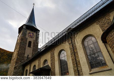 Zermatt, Switzerland-october 21, 2019:the Old Chuch Building On Zermatt Bahnhofstrasse Street In Aut
