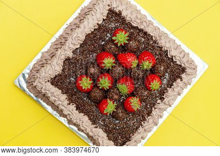 Homemade Chocolate Cake Covered With Chocolate Sprinkles And Fresh Strawberries. Known In Brazil As 