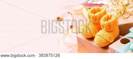 Yellow Warm Handknitted Baby Shoes For Little Girl Or Boy And Gift Box - Concept Of First Step, Birt