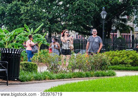 New Orleans, Louisiana/usa - 7/5/2020: People In Jackson Square, Some With And Some Without Face Mas