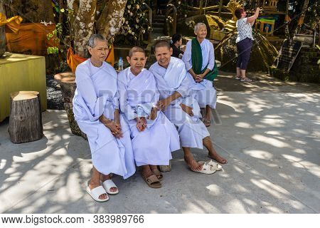 Phuket, Thailand - November 29, 2019: Buddhist Nuns Are Sitting Near The Big Buddha Temple, Thailand
