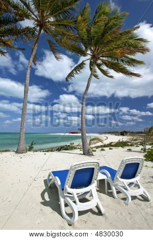 Beach Chairs On Sunrise Beach