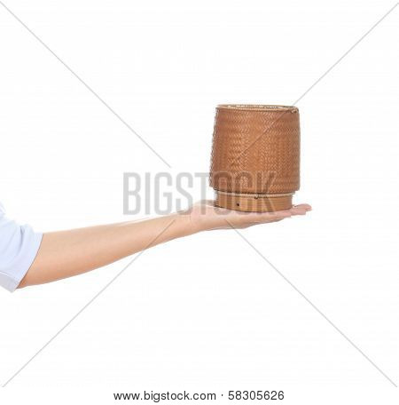 Hand Holding Bamboo Rice Box