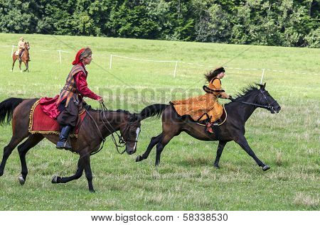 History Fans Dressed As 17Th Century Polish Gentry Ride On Horseback