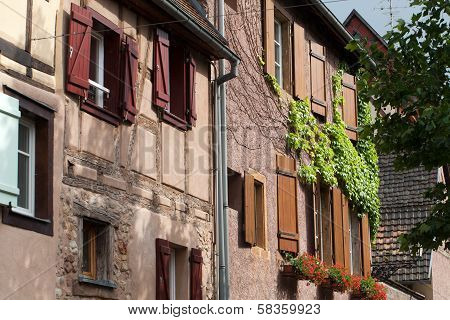 Street with half-timbered medieval houses in Eguisheim