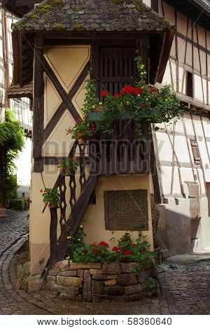 Street with half-timbered medieval houses in Eguisheim