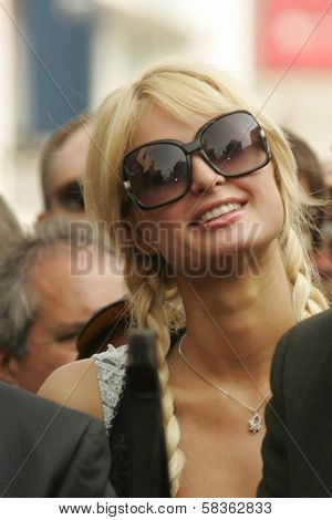 Paris Hilton at the Ceremony Honoring Los Angeles Lakers Owner Jerry Buss with the 2,323rd star on the Hollywood Walk of Fame. Hollywood Boulevard, Hollywood, CA. 10-30-06