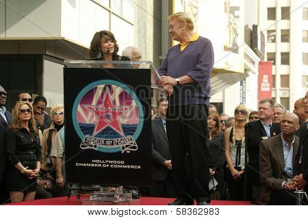 Paula Abdul and Jerry Buss at the Ceremony Honoring Los Angeles Lakers Owner Jerry Buss with the 2,323rd star on the Hollywood Walk of Fame. Hollywood Boulevard, Hollywood, CA. 10-30-06