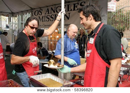 LOS ANGELES - NOVEMBER 22: Kevin Nealon and Victor Webster at The Los Angeles Mission Thanksgiving Meal for the Homeless  November 22, 2006 in Los Angeles Mission, Los Angeles, CA.