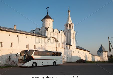 Tourist bus near the monastery walls.