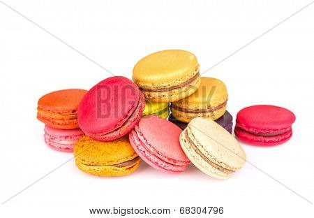French colorful macarons on white background