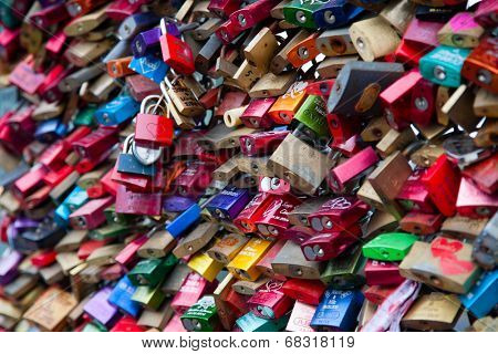 COLOGNE, GERMANY - MAY 29, 2014, Thousands of love locks which sweethearts lock to the Hohenzollern Bridge to symbolize their love on May 29 in Koln, Germany 