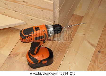 Black And Orange Electric Screwdriver With A Reamer