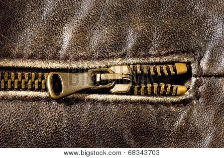 Brown leather texture and zipper background 