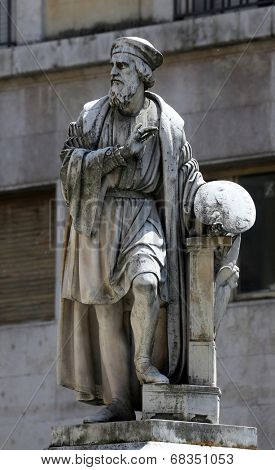 PARMA, ITALY - MAY 01, 2014: Parmigianino statue. Parma is famous for its ham, cheese and architecture. It is home to the University of Parma, one of the oldest universities in the world. 