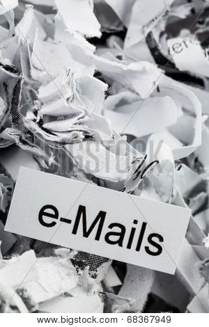 shredded paper tagged with e-mails, symbol photo for data destruction, mails and data flooding