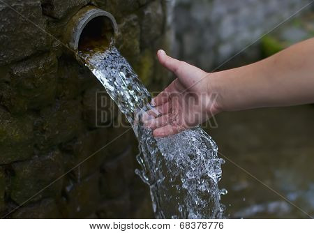 Falling Water And Hand
