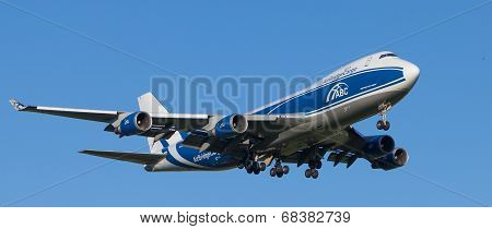 Airliner calling on landing at the airport before landing in the evening