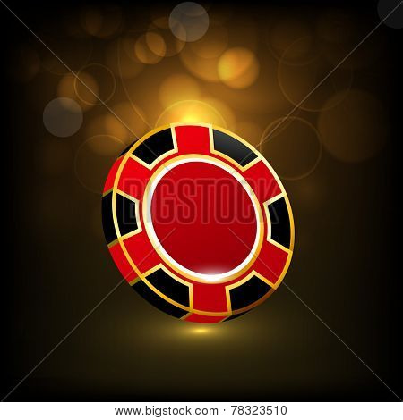Shiny colorful casino chip on brown abstract background.